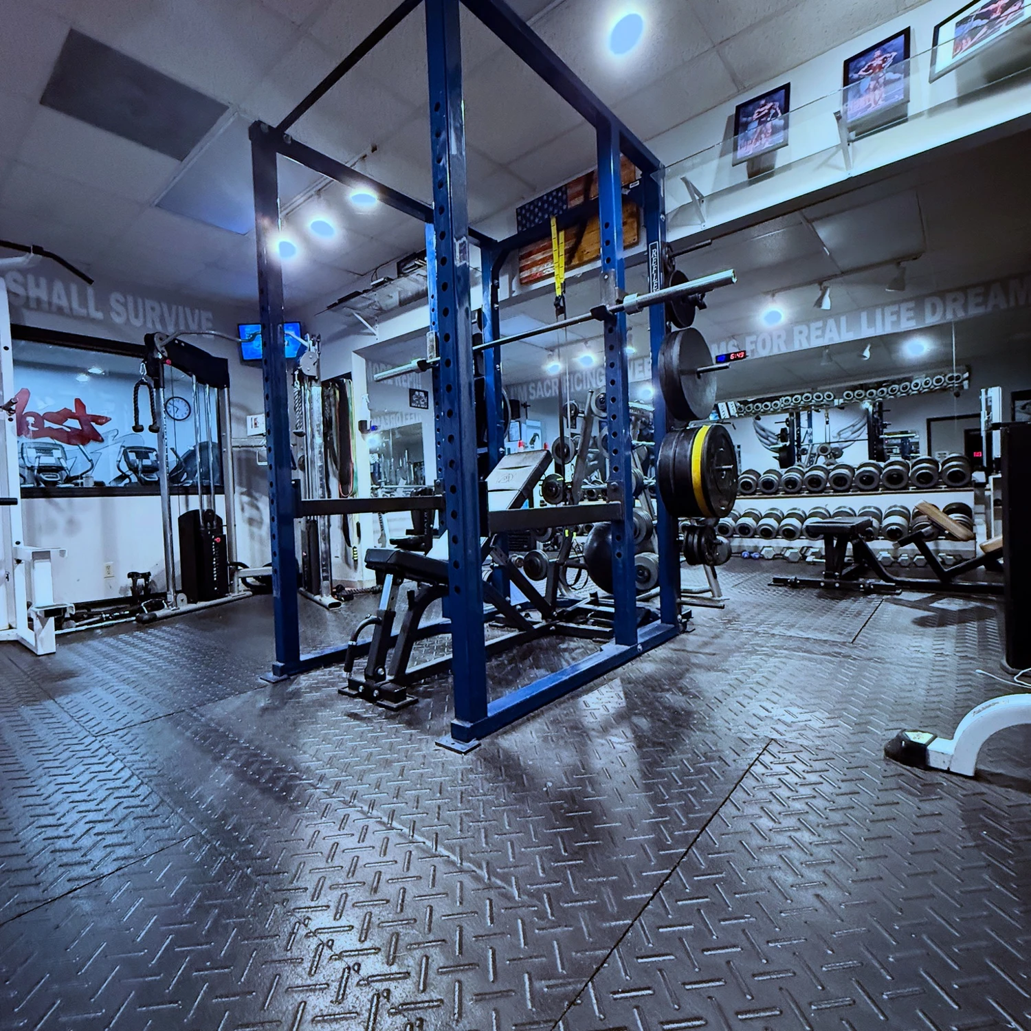 Walcott strength training area with power rack and free weights